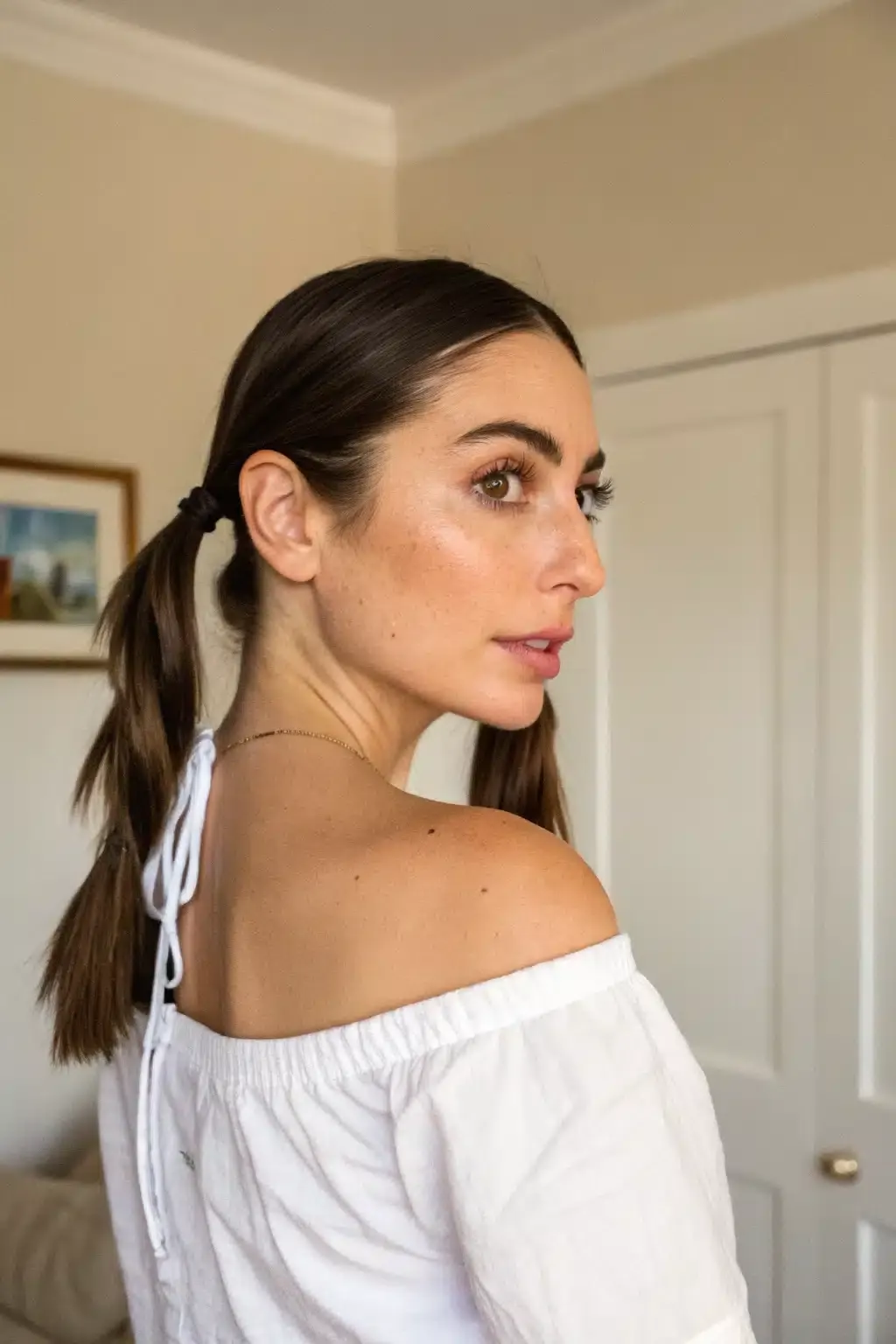 13) Sleek straight pigtails