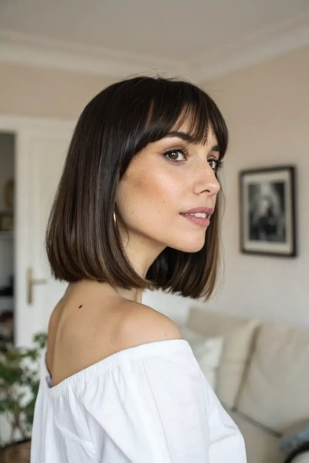 8) Blunt Side Bangs with Straight Bob