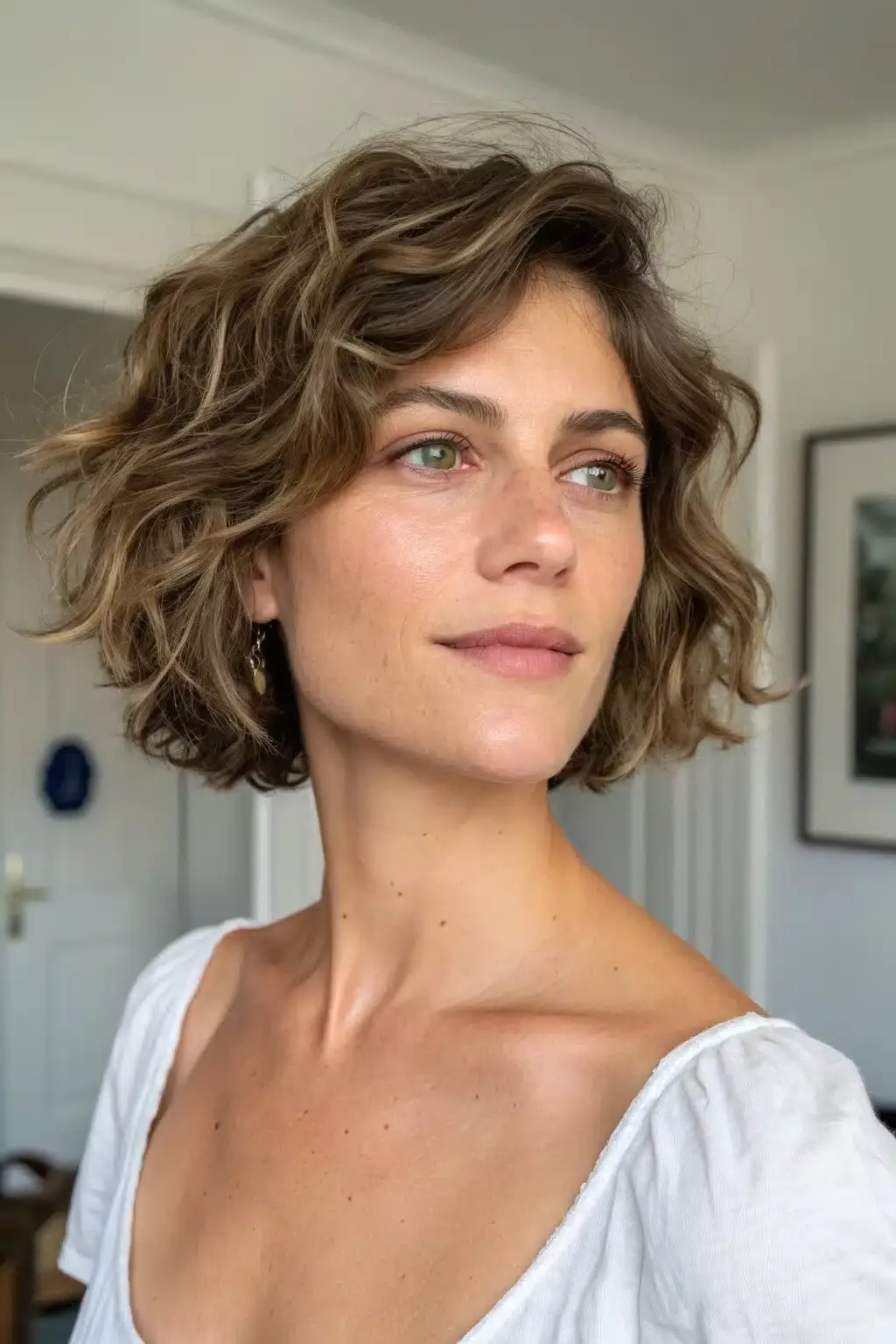 9) Feathered Short Hairstyle