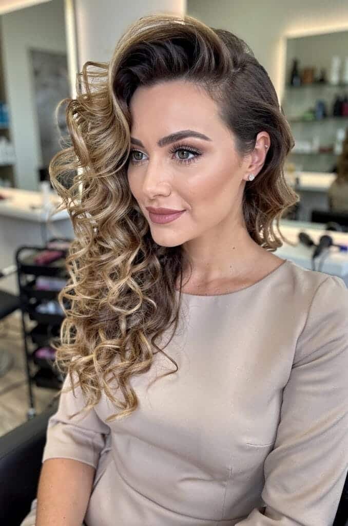 Voluminous Side-Swept Curls