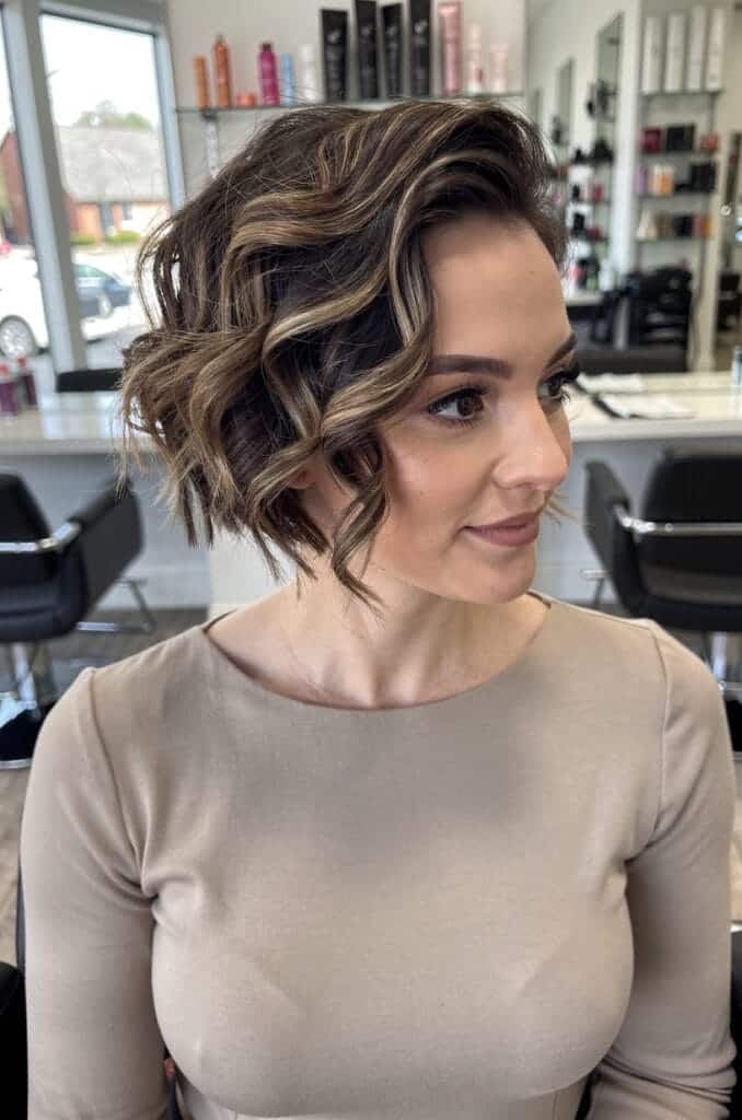 12. Curly Pixie with Highlights
