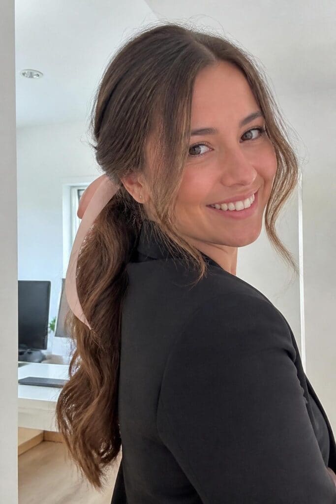 6. Low Ponytail with Ribbon Waves