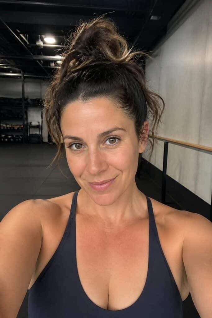 7. Top Knot with Wavy Ends