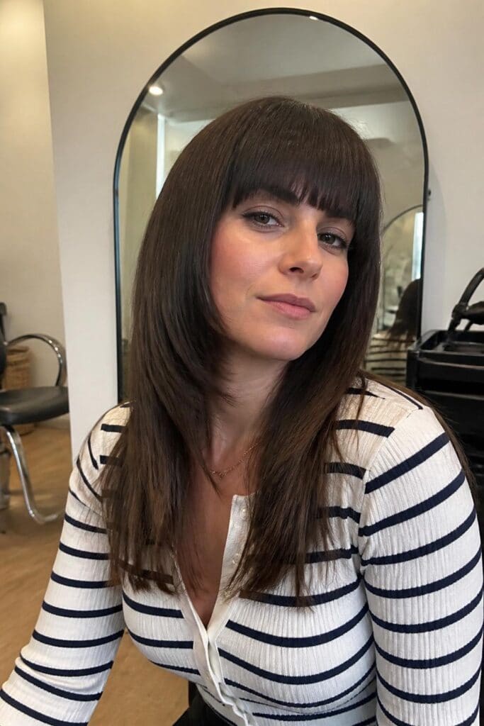 Blunt Bangs with Straight Hair and Layers