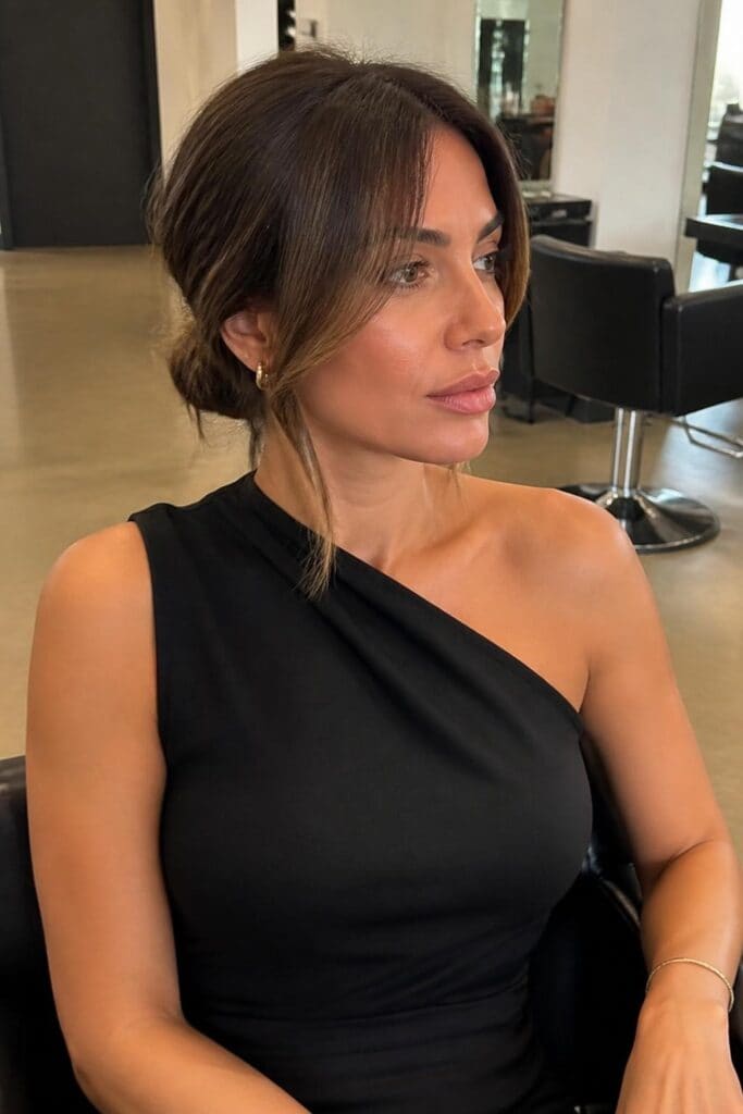 Curtain Bangs with Straight Hair and Low Bun