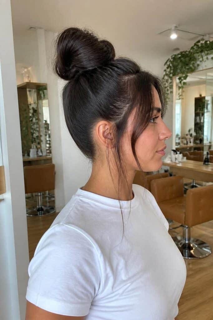 High Bun with Face-Framing Strands