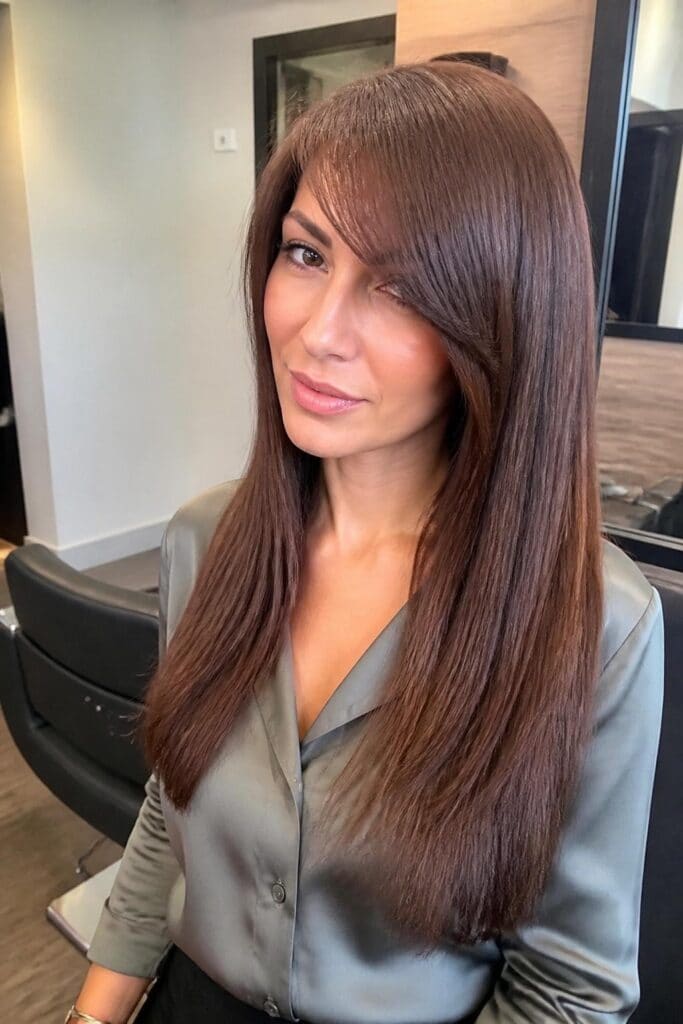 Side-Swept Bangs with Long Straight Hair