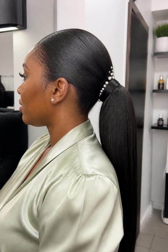 Sleek Ponytail with Pearl Accents