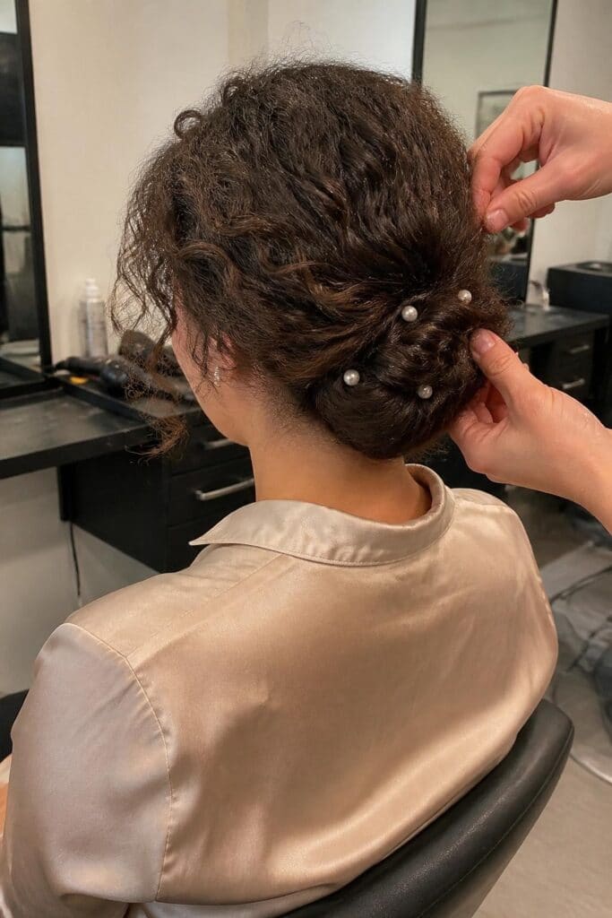 Twisted Low Bun with Pearl Accents