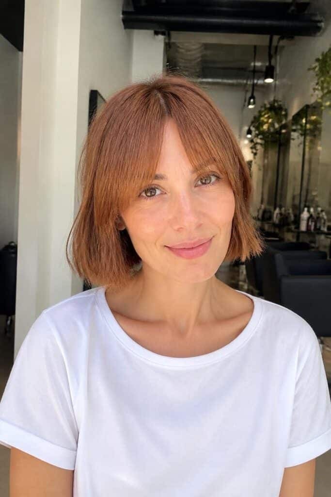 Wispy Curtain Bangs with a Lob