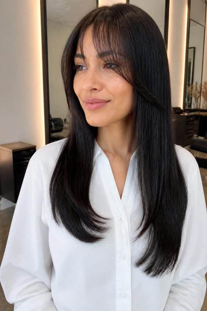 Wispy Curtain Bangs with Sleek Straight Hair