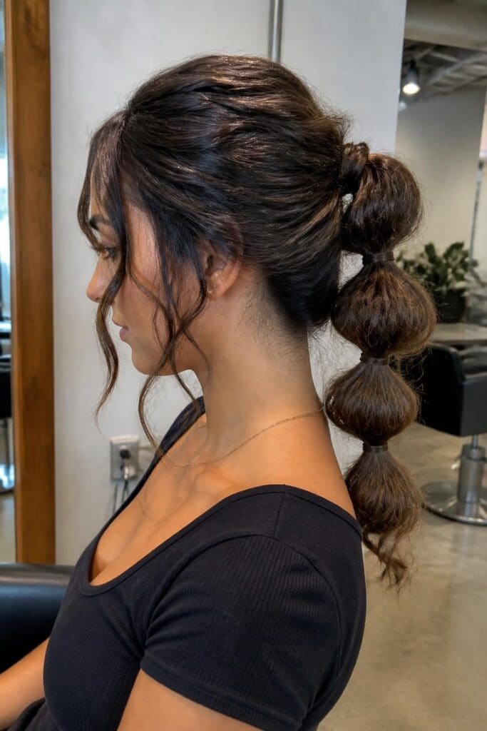 9. Bubble Ponytail Updo for Waves