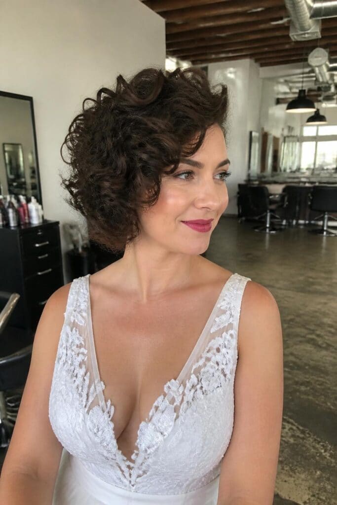 Voluminous Curly Bob with Deep Side Part